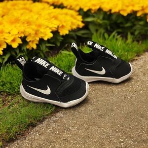 Nike Black and White Sneakers with Slip-On Design